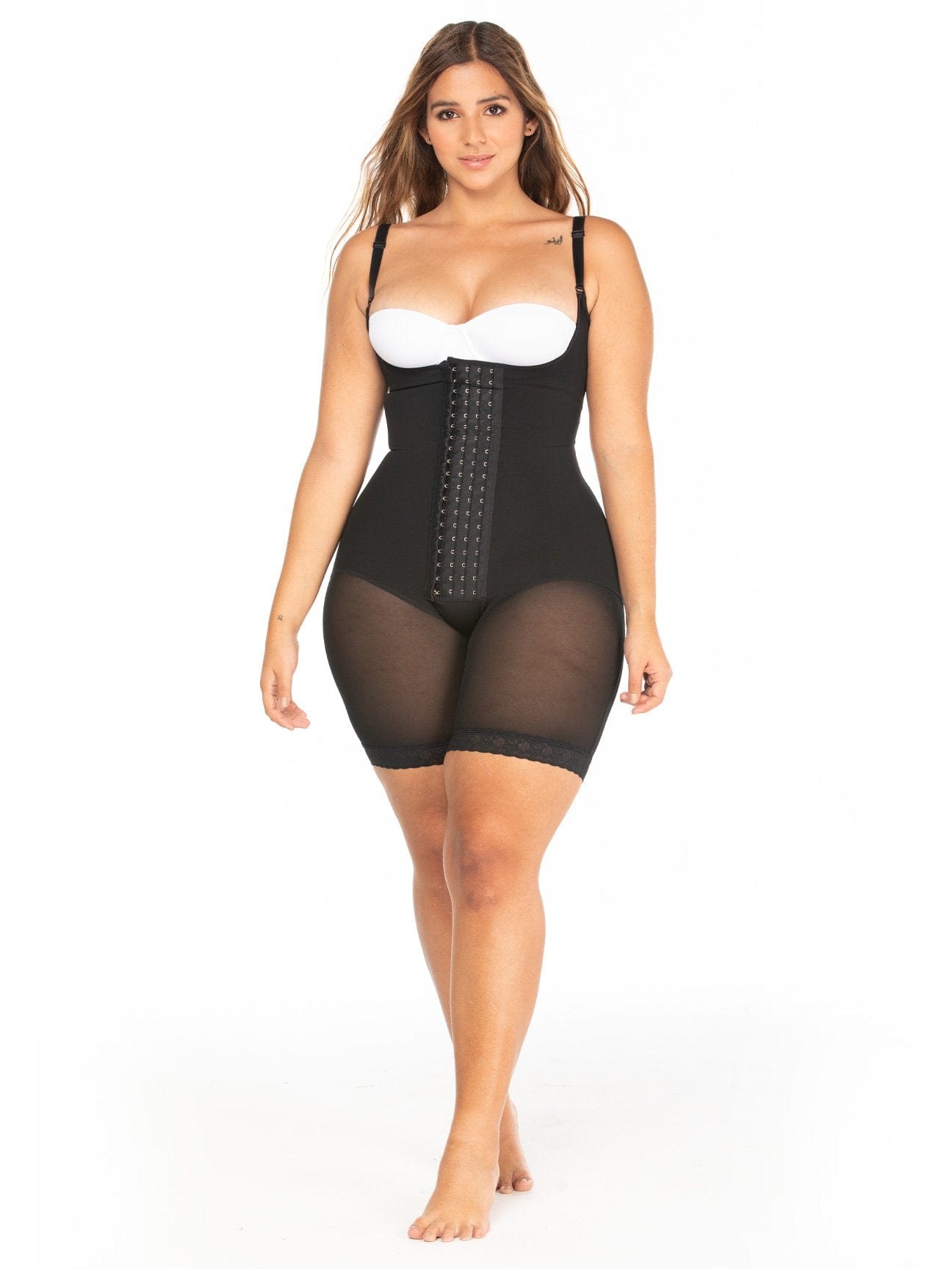 full body view curvy latina wearing high compression faja with vest 